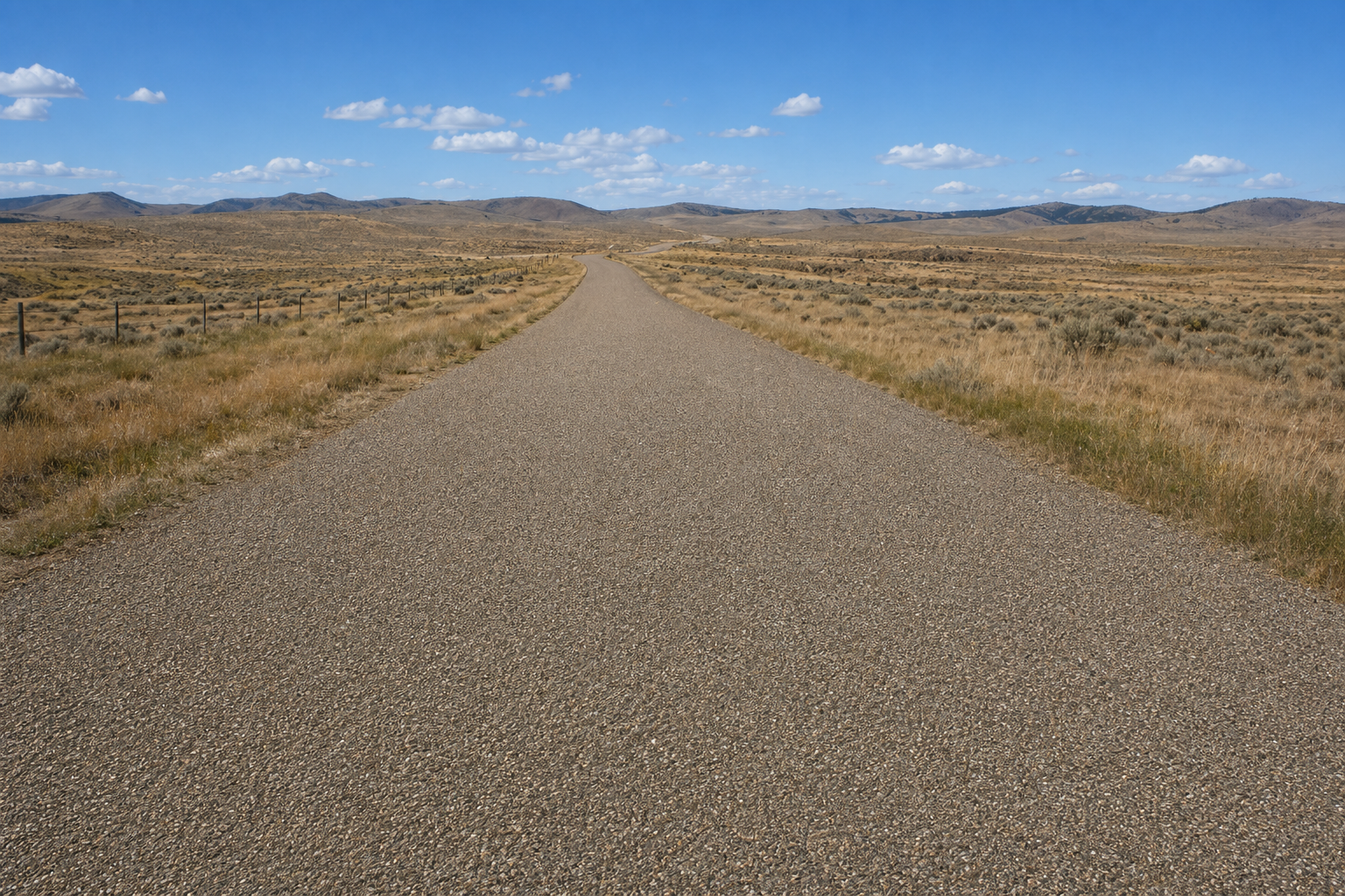 Fresh chip seal road across Wyoming rangeland