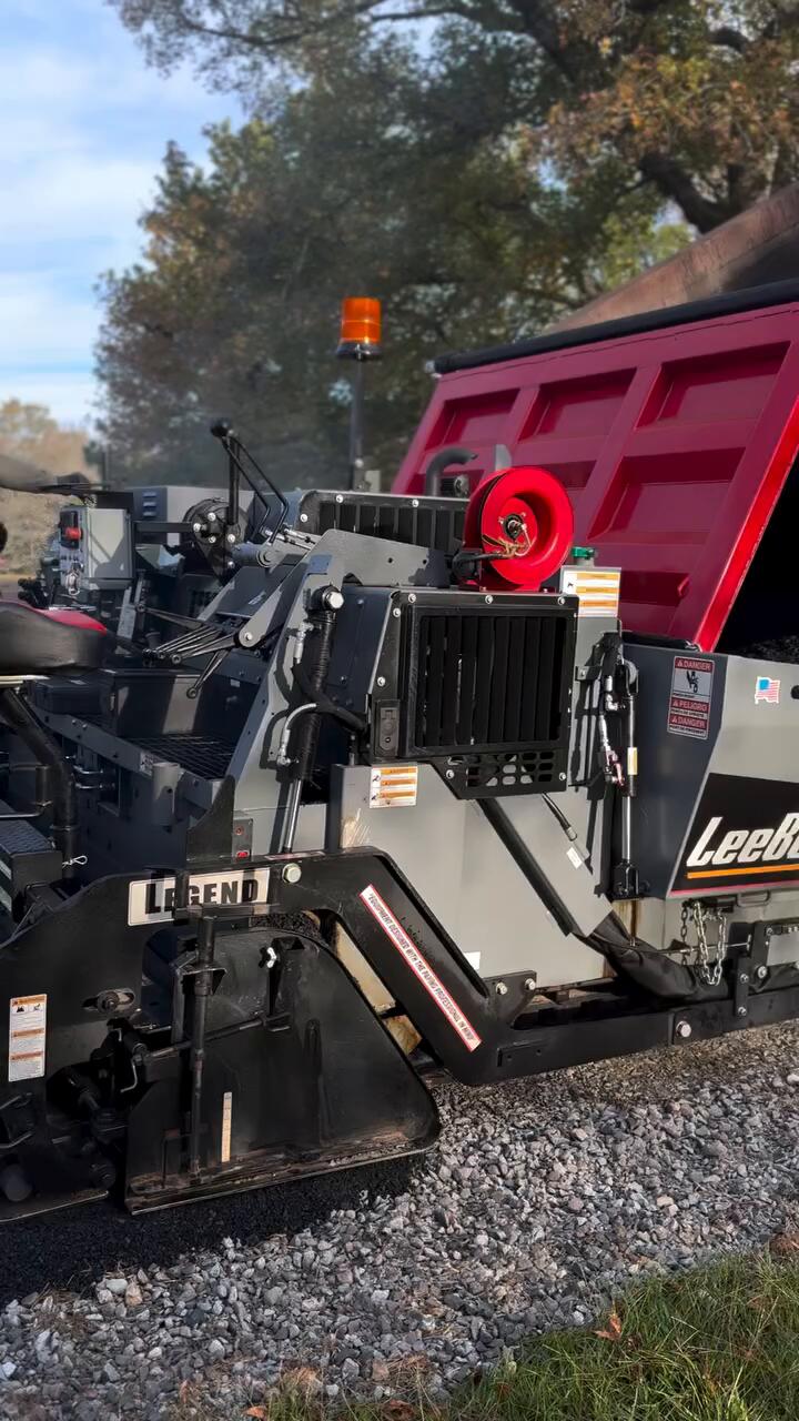LeeBoy paver and dump truck on a Paving Pro of Wyoming job site