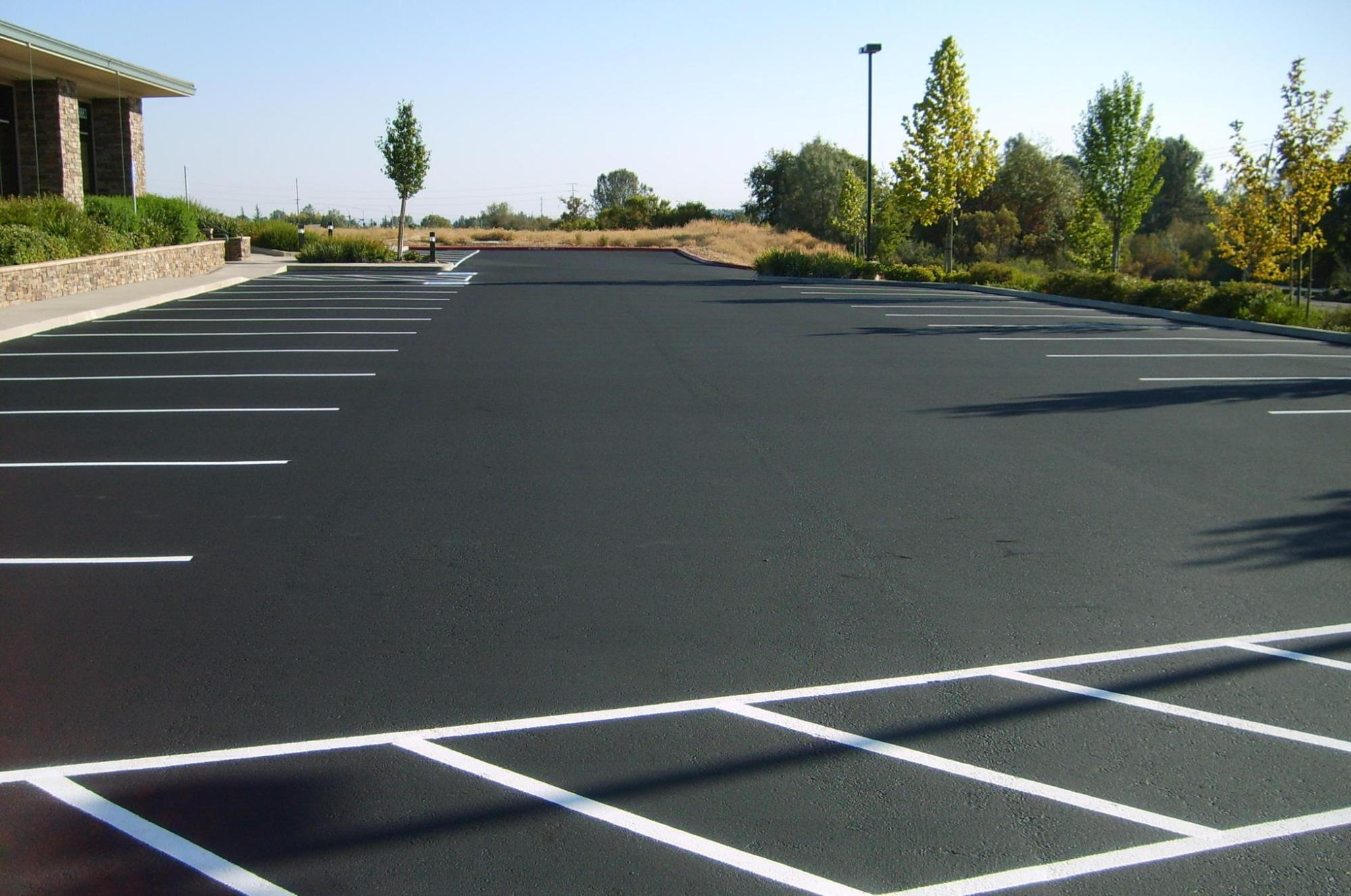 Freshly paved and striped commercial parking lot